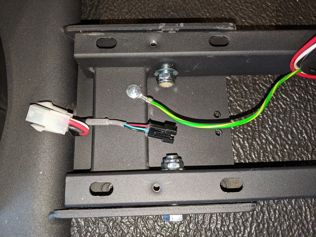 E95 Step 1-1 06 Grounding screw loosened, wire moved, screw tightened.jpg