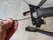 E95 Step 1-3 05 Gently pull long (fish) twist tie from top of Mast (by floor).jpg