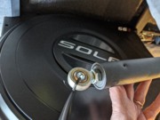 E95 Step 2-4 06 Twist tie holds required spacer (24) into rod end of right lower arm.jpg