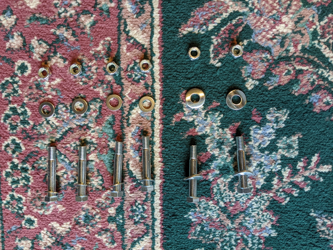 E95 Step 3-1 01 Bolt (206) assemblies with Nuts (187), two with Curved (181) and four with Flat (164) washers.jpg