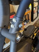 E95 Step 3-1 04 Insert Swig Arm, then three bolt assemblies (curved from side).jpg