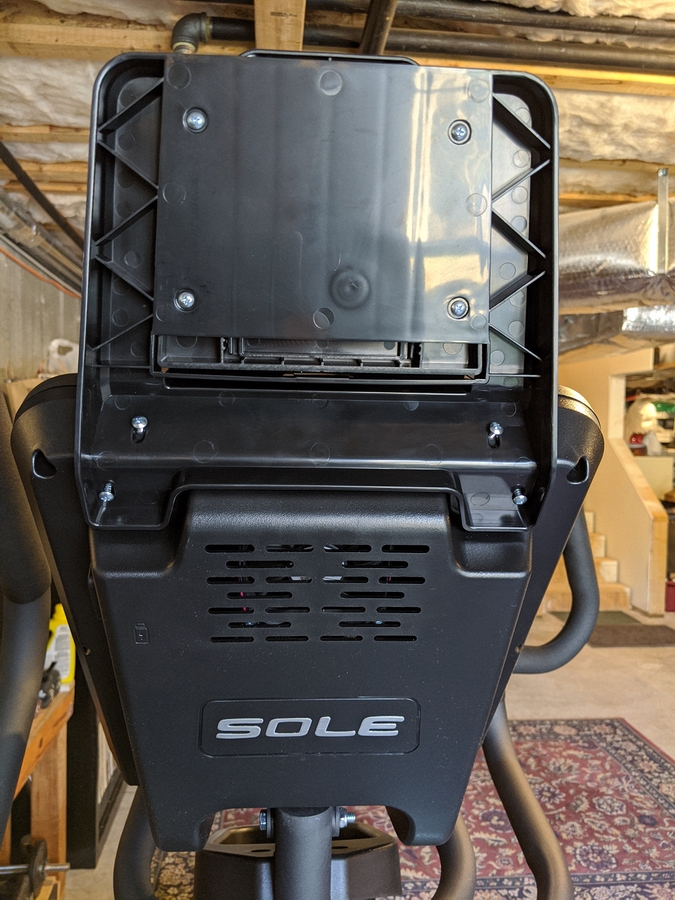 E95 Step 4-02 02 Mount Tablet Holder to top back of Console; screws ready to tighten.jpg