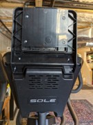 E95 Step 4-02 02 Mount Tablet Holder to top back of Console; screws ready to tighten.jpg