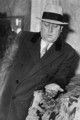 1933-03-24 Chief County Detective, Harry B Crook, holding slugs taken from the body of Al Lillien.jpg