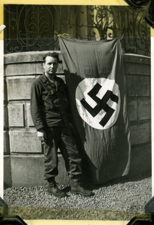 1944-09~ Harry & Nazi Flag.jpg