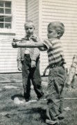 1955-05-14~ 2 Pete Jr watches Dan launch flying saucer.jpg