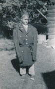 1957-07 0 Dan tries on Pete Sr's army jacket, which was airing on the line.jpg
