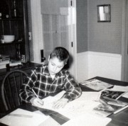 1961-04~ Dan working on a school report.jpg