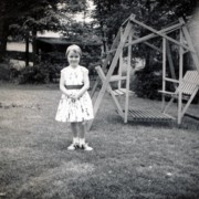 1961-07-07 1 Andrea's new dress - 'white pique with bright flowers with green sash'.jpg