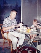 1961-09-03~ 05 Pete Sr & Andrea, hearty lunch in playroom, Islesboro ME.jpg