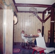 1961-09-03~ 06 Andrea & Dan - old maid and Dr Pepper -  in playroom, Islesboro ME.jpg