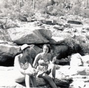 1954-10-15 1 Til & Jane cooling their feet, stone tub, Sabino Canyon, Tucson AZ.jpg