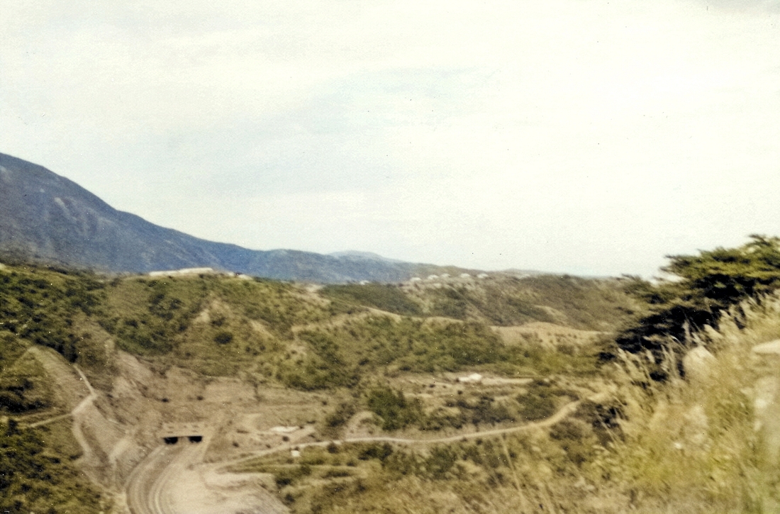 1954-10-08 2 New road cut thru mountains, en route to Caracas, Venezuela.jpg