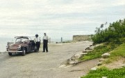 1956-09 09 Ped, our driver & taxi with fringe on top, Fort Catherine, Bermuda.jpg