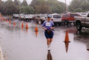 2004-09-18 1 Karen finishing Team With A Vision 5K in a downpour.jpg