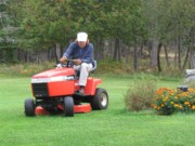2004-10-11 Pete mowing the back yard, Islesboro.JPG