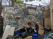 2023-05-09 190 Tish explains Isaiah Zagar Mosaic, Magic Gardens, Philadelphia.jpg